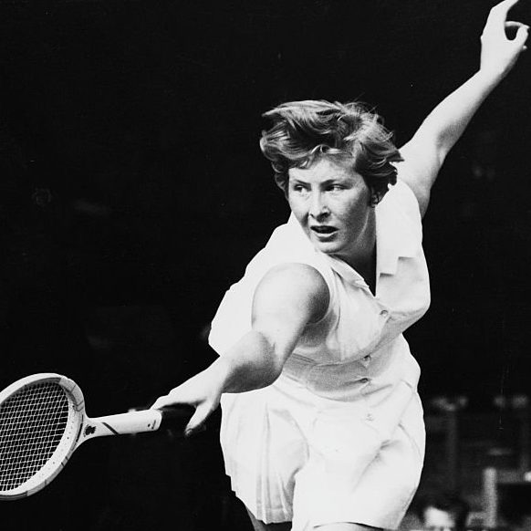 Tennis player Christine Truman in action against Darlene Hard in a match at the Wightman Cup at Wimbledon, London, June 10th 1960. (Photo by Central Press/Hulton Archive/Getty Images)